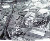 This photograph shows an aerial view of the colliery and clay works at Pye Hill. At the top left can be seen Pye Bridge and Kempson's Acid Works 1946