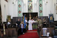 Members of the Church, Alfreton ACF, Scouts and Guides preparing to leave after the service.