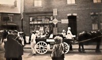 Hospital day float in Coupland Place at the front of West's Shop, photograph taken from the front of Abbott's Warehouse.