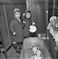 Children at the Somercotes Bazaar with the Somercotes version of Hook a Duck, Hook a Swan 20th November 1967.