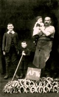 William Dawes and family members in the Blacksmiths shop on Mansfield Street, Somercotes.