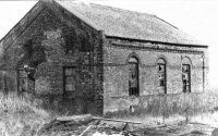 One of the old colliery buildings on the W. Bush recycling yard at Muckram off Birchwood Lane.