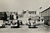 Alfreton Bus Station, Four Horse Shoes in background