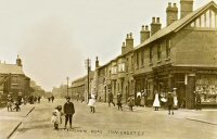 Nottingham Road, Somercotes with Mill Street on the right. George Beastall's premises, Oporto House can be seen in the centre of the photograph. This was built in 1901. The photograph seems to have been taken a few years later.