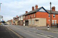 Nottingham Road, Somercotes, with Mill Street on the right. Taken in 2012.