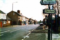 A photograph looking down Somercotes Hill. The Devonshire Arms is extreme left of the photograph. Taken in 2012.