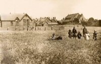 Somercotes Junior School. This photograph is taken from the recreation ground area. Note the Church of St. Thomas on the upper right of the photograph. It probably dates from around 1910.This picture appear on a bowl in St. Thomas Church.