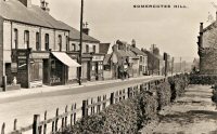 Somercotes Hill. The shops at the top of Somercotes Hill. The photograph has been taken from the Market Place.