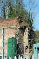 Riddings Ironworks (Pye Bridge) - Walls to tunnels still in place in the old retaining wall 2014