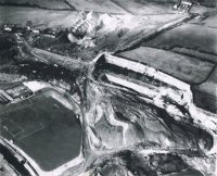 Picture shows the Ironworks Sports Ground now the Rugby Club. Waste Disposal Area behind Ironworks Sports Ground and possibly clay extraction works at the back.