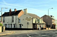 The Devonshire Arms showing the junction of Birchwood Lane, 2012