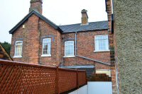 Rear of the buildings which were part of the old Rose & Crown Inn, which closed around 1910.