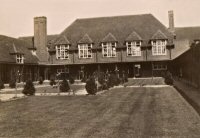 This photograph shows the quadrangle of the school (pupils were not allowed to walk on the grass!). It dates from the 1940s.