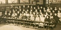 This class photograph is taken in the old Infants School on Sleetmoor Lane. It probably dates from the very early 1900s