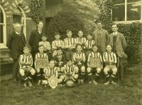 Somercotes Boys School Football Team, taken outside of the School House on Nottingham Road. The photograph dates from the 1921-22 season.
