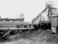 Pictured people and Children inspecting the Engine House Fire at Cotes Park Colliery in 1909