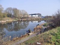 Fishing in Pennytown Pond Cotes Park Industrial Estate in the background