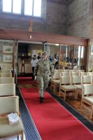 A member of the Alfreton Army Cadet Force entering the Church for the service.