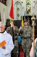 The Procession leaving the Church lead by the Church official 2014