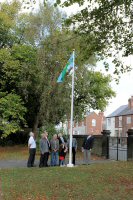 Raising of the Derbyshire Flag after the Remembrance Service by members of the public and Council