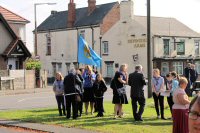 Guides and members of the public gathering before the Remembrance Service