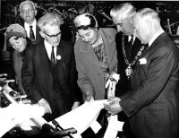 Mr. K. Jordan showing the Chairman of Alfreton U.D.C. (Councilor R. Bowizer), Mrs, Bowizer,  one of the new machines 1964
