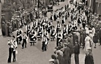 Somercotes Toreadors Carnival Band in a parade on King Street, Alfreton in the 1930's.