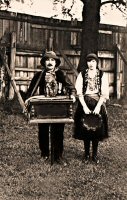 Mr. Harry Sewell and hid Daughter Elsie. Dressed for a Carnival. The family lived on Sleetmoor Lane and used to attend various local Carnivals and events.