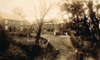 Pennytown early Postcard showing two ladies outside their homes.