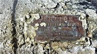 Old Air Raid Siren plaque found under concrete on a wall, on Somercotes Hill.