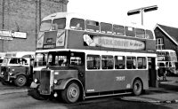 1950s photograph of Trent Bus KCH 114 in Alfreton Bus Station behind the Odeon Cinema.
