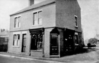William Dawes & Sons Ironmongers shop on the junction of Victoria Street, and Mansfield Street Somercotes. The Blacksmiths shop and engineering workshop were on Mansfield Street down the right hand side of the shop.