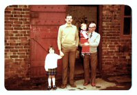 Family members of William Dawes outside the Blacksmiths shop on Mansfield Street, Somercotes.