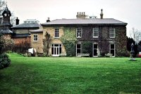 The back view of Riddings House, showing the main building and Clock Tower circa 1970's.