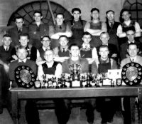 Cotes Park Colliery sports team with their trophies and awards.