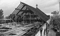 The new roof timbers being installed during the rebuilding of the roof in 1984 after a fire.