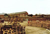 A building on the Pye Bridge Industrial Estate used for Pallet recycling, the old Ironworks long shop can be seen in the background.